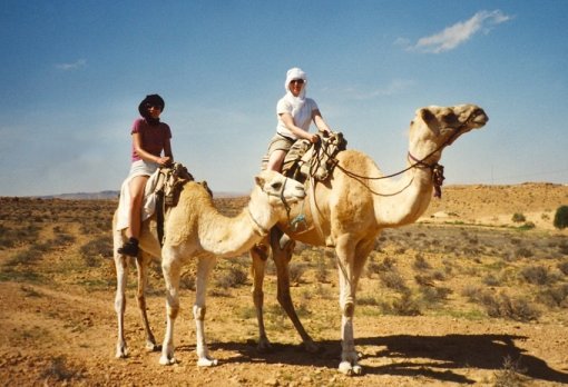 Agnes and I riding on camels